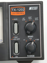 Nissei TX-1202 SWR en Watt meter close up van de bedieningsknoppen