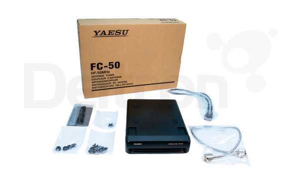 Yaesu FC-50 antenne tuner met meegeleverde accessoires en verpakking